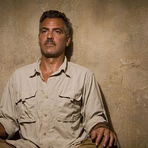 Bilder Männer, die auf Ziegen starren