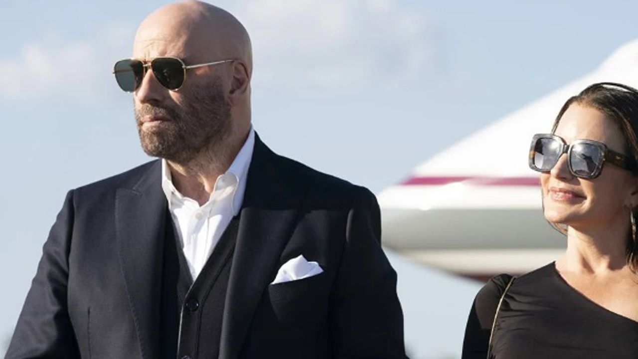 John Travolta und Kristen Davis in „Cash Out – Zahltag“.