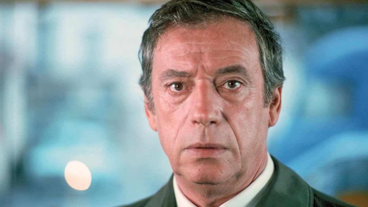 Marc Ferrot (Yves Montand) ist von der Fotografin Sylvia fasziniert